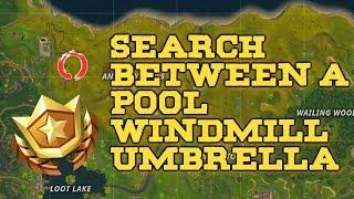 Search Between a Pool Windmill And an Umbrella Fortnite