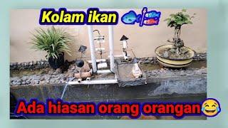 Kolam ikan hias depan rumah-ada orang orangan nya bisa bergerak 