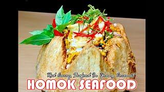 Homok Seafood  Red Curry Seafood In Young Coconut