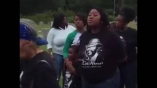 family of amazing Singers sing at graveyard 