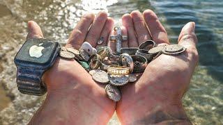 Waterproof Metal Detecting Under a CLOSED WATERPARK $15000+ 12 Rings 2 Watches and 40 Coins
