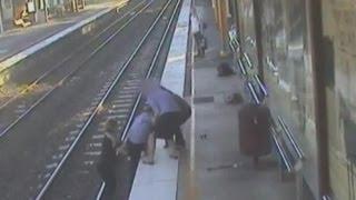 Dramatic footage Trainee nurse saves man from train track in Australia