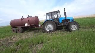 PLANTED A TRACTOR IN THE MUD