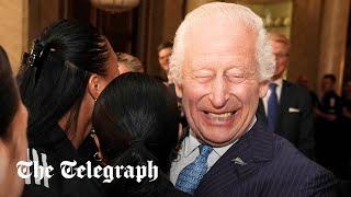 A hug why not? King Charles III enjoys group hug turned scrum with New Zealand rugby team