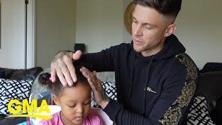 Dad doing his daughters hair is too cute to watch