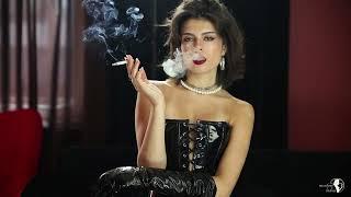 Attractive lady smokes cigarette