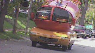 Tim Ezell rides in the Wienermobile