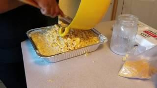 Smothered Pork Chops Macaroni & Cheese Greens  & Baked Beans