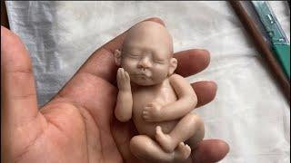 Sculpting a Micro polymer clay baby part 2