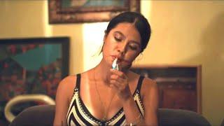 Laura Osma smoking cigarette