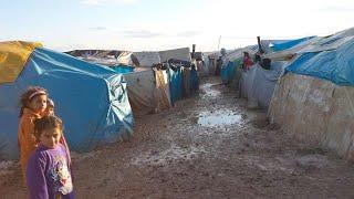 ÜBERSCHWEMMUNG - JETZT HEIZMITTEL VERTEILEN IN DEN CAMPS VON SYRIEN