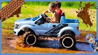 Unboxing Ride on Cars - Power Wheels Ford F150 Raptor Truck Rides in the Mud