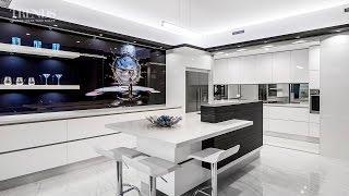 Sleek contemporary entertainers kitchen with separate scullery and decorative waterdrop splashback