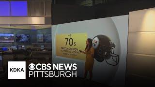 First Alert Meteorologist Mary Ours practices the national anthem before the Steelers game