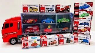 Box full of various miniature cars Peugeot Volvo Renault Hyundai Pagani Cadillac One DHL