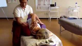 Ron demonstrates table Thai side lying at somatherapy institute in Rancho mirage