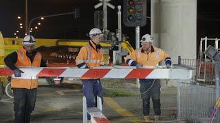 Boom gates are removed at Keon Parade – 77th level crossing removed