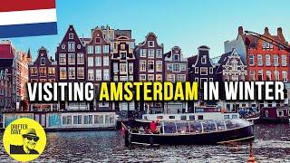 Winter layover in Amsterdam Netherlands Damrak walking tour flower market and canal cruise