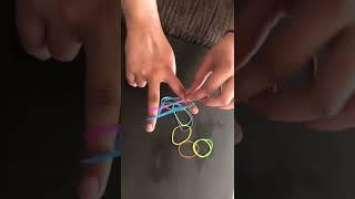 Making rubber band bracelets by rubber bands. ￼#rubberband #bracelet