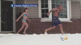 11-Year-Old Girl Dad Enjoy Snow Day In Bathing Suits