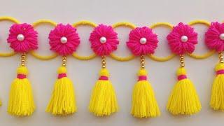 ऊन से बनाए नए डिजाइन की तोरणWoolen toran designWoolen flower door hangingWoolen craft ideas#wool