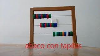 como hacer un ábaco casero para niños con tapitas plasticas