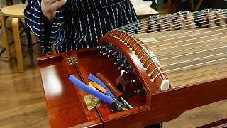 Use a full size guzheng string on a travel size guzheng