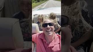 Bald Dad Rocks Convertible Ride