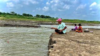 Fishing Video  Traditional boy is fishing using two hooks in the deep current of the river