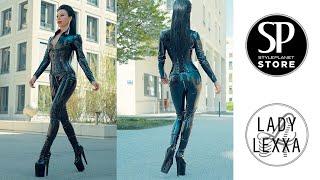 WALKING IN LACK CATSUIT LACK CORSET AND EXTREM PLATEAU BOOTS FROM STYLEPLANET FASHION STORE.