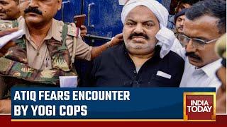 Watch Police Convoy Taking Jailed Gangster Atiq Ahmed On A 1300 Km Return Route To  UPs Prayagraj