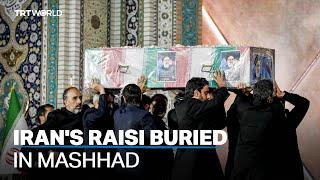 Iranian President Raisi buried in Mashhad