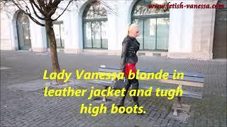 Lady Vanessa blonde in leather jacket and tugh high boots