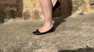 iPhone 10 trample wearing shiny black ballerina flats