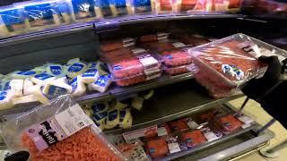 Stocking up fresh meat  Grocery Store POV