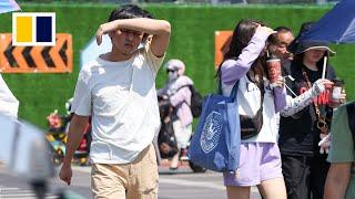 Beijing issues 3rd highest heat warning