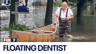 Waterville dentist uses canoe to ferry patients in during flood