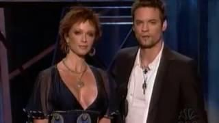 Sexy Lauren Holly gives Radio Music Award to Rascal Flatts