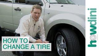 How to Change a Tire  Change a flat car tire step by step