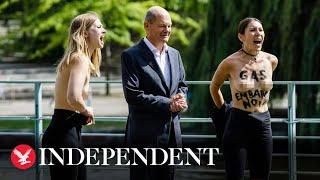 Topless protesters in Germany call for gas embargo