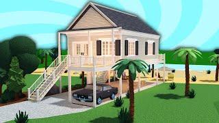 i made a beach house in bloxburg...