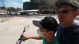 Melasti Beach Bali Indonesia riding an electric Bike