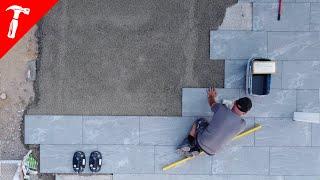 Terrasse bauen Keramikplatten in Mörtel verlegen