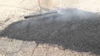 Pothole Repair Filling with hot-mix Smith & Sons