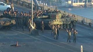 Turkish soldiers walk with hands up