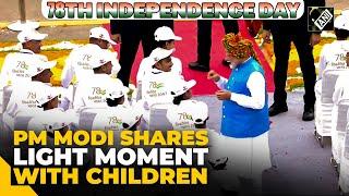 Prime Minister Narendra Modi shares light moment with children at Red Fort