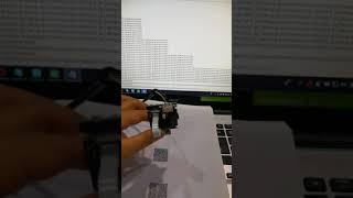 RT211 OEM barcode scanner reading QR code on paper