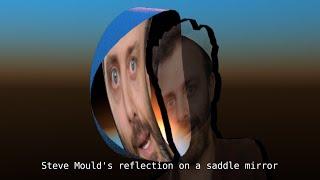 Steve Moulds reflection on a saddle mirror.