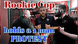 OFFICER HOLDS A PROTEST WHILE ON DUTY Grumpy Gills rookie  needs to chill 