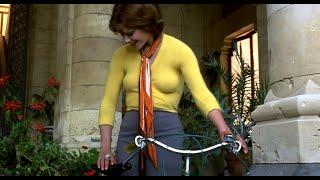 Tina Aumont in tight yellow sweater Braless Getting on a Bicycle 1080P BD